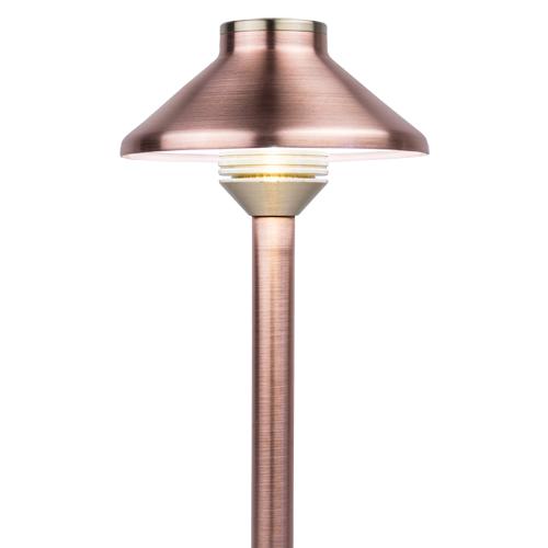 FX Luminaire JS LED path light with a copper shade and riser on a white background